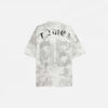 Back view of the white Vintage Graphic Printed Grunge T-Shirt in a gray background
