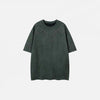 Front view of the green Vintage Oversized Embroidered T-Shirt in a gray background