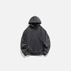 Front view of the black Shadow Vibe Hoodie in a gray background