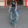 Classic Metro Rinse High-Rise Torn Denim