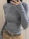 Model wearing the gray Modern Maven Top