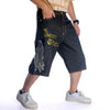 Knee-Drop Distressed Denim Shorts