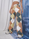 Model wearing the brown GeoKnit Couture Pants
