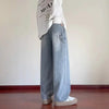 Vintage Yıkanmış Yırtık Detaylı Düz Kesim Jean Pantolon, yakın çekim — Navra Wear