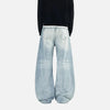 Yıkanmış Yırtık Detaylı Baggy Jean Pantolon, yakın çekim — Navra Wear