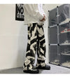 İspanyol Paça Zebra Desenli Jean Pantolon, detay görünüm — Navra Wear