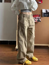 Yıkanmış Yırtık Detaylı Yüksek Bel Baggy Jean Pantolon, model üzerinde — Navra Wear