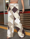 Model wearing the coffee GeoKnit Couture Pants