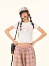 Turn-Of-Era Woman's Bow Patterned Crop Top