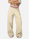 Beige pants with a Calvin Klein waistband on a white background