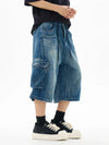 Yıkanmış Yırtık Detaylı Baggy Jean Şort, yakın çekim — Navra Wear