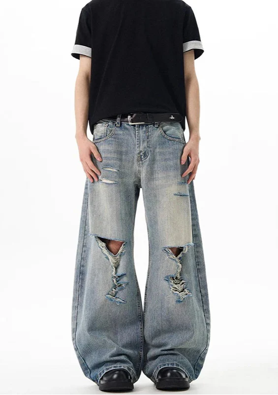 Heritage Blue Torn Bell Leg Denim