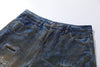 Yırtık Detaylı İspanyol Paça Jean Pantolon, yakın çekim — Navra Wear