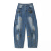 Yıkanmış Yırtık Detaylı Baggy Jean Pantolon, yakın çekim — Navra Wear
