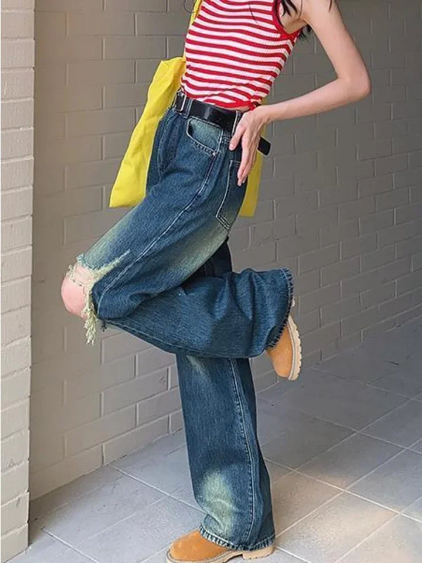 Women Cutting Sleek Heritage Torn Denim