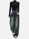 A model posing in the Vintage High Waist Women's Jeans