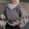 Model wearing the dark grey Y2k Retro Layered Hoodie 