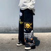 Y2K Wide Leg Grafiti Baskılı Pantolon, kombin görünüm — Navra Wear