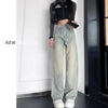 Vintage Yıkanmış Yırtık Detaylı Yüksek Bel Wide Leg Jean Pantolon, yakın çekim — Navra Wear