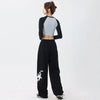 Kadın Bol Kesim Yıldız Baskılı Jogger, model üzerinde — Navra Wear