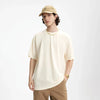 Model wearing the apricot Essential Everyday T-Shirt