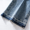 Yıkanmış Yırtık Detaylı İspanyol Paça Jean Pantolon, yakın çekim — Navra Wear