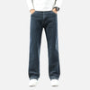 Model wearing the gray blue Classic Denim Jeans