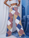 Model wearing the khaki GeoKnit Couture Pants