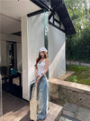Butter-Smooth Rinse High-Rise Bell Leg Denim