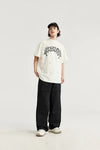 Model wearing the black Trailblazer Baggy Cargo Pants in a gray background