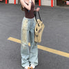 Modern High-Rise Relaxed Torn Denim