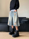 Yıkanmış Yırtık Detaylı Jean Şort, yakın çekim — Navra Wear