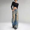 Signature High Waisted Torn Denim