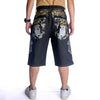 Knee-Drop Distressed Denim Shorts