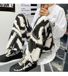İspanyol Paça Zebra Desenli Jean Pantolon, arka görünüm — Navra Wear